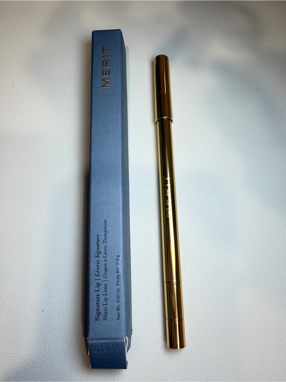 Merit Signature lip sheer liner Color: Capricorn - rich brown
